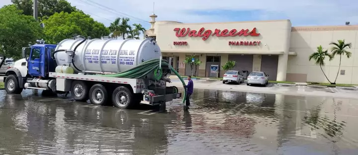 walgreens flooded parking lot storm drain 1
